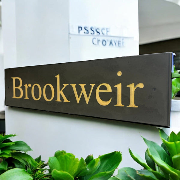 Introducing our stunning 40cm x 10cm Polished Natural Slate House Sign, designed to make a lasting impression! Crafted with durability in mind, it features beautifully carved lettering that enhances its elegance and visibility. Transform your home's entrance with this exquisite sign! www.HouseSign.co.uk