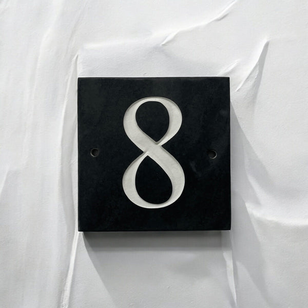 Introducing our stunning 15cm x 15cm Polished Natural Slate House Sign, designed to make a lasting impression! Crafted with durability in mind, it features beautifully carved lettering that enhances its elegance and visibility. Transform your home's entrance with this exquisite sign! www.HouseSign.co.uk