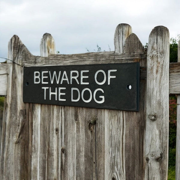 A Beware Of The Dog Gate Sign made in Natural Slate with polished edges and hard-wearing carved lettering www.HouseSign.co.uk