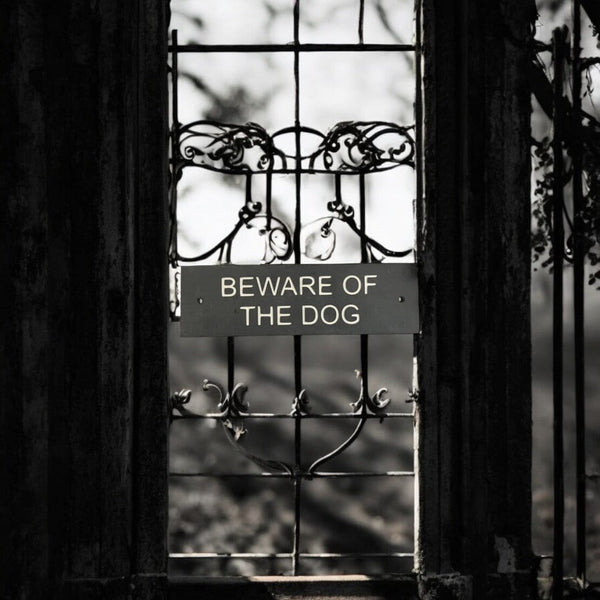 A Beware Of The Dog Gate Sign made in Natural Slate with polished edges and hard-wearing carved lettering www.HouseSign.co.uk