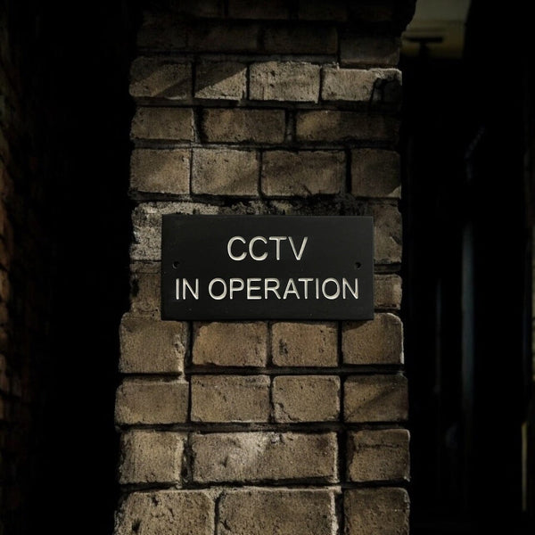 A CCTV Gate Or Wall Sign made in Natural Slate with polished edges and hard-wearing carved lettering www.HouseSign.co.uk