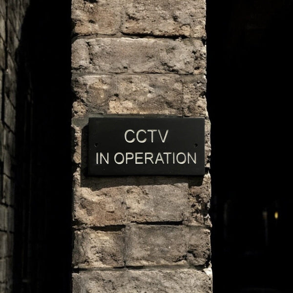 A CCTV Gate Or Wall Sign made in Natural Slate with polished edges and hard-wearing carved lettering www.HouseSign.co.uk